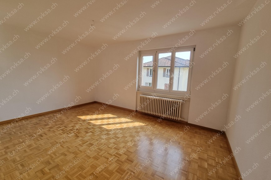 Appartement de 3 pièces, 66 m2, à Les Geneveys-sur-Coffrane Appartement de 3 pièces, 66 m2, à Les Geneveys-sur-Coffrane - Chambre N°1