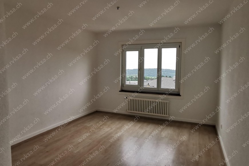 Appartement de 4 pièces, 74 m2, à Les Geneveys-sur-Coffrane Appartement de 4 pièces, 74 m2, à Les Geneveys-sur-Coffrane - Chambre N°1
