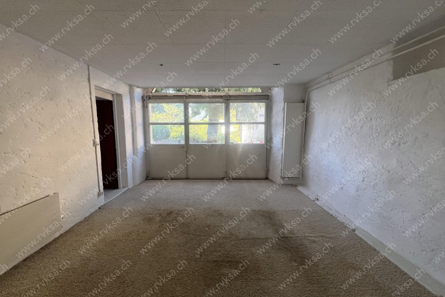 Local commercial de 1.5 pièces, 39.79 m2, à Bôle Local commercial de 1.5 pièces, 39.79 m2, à Bôle - Chambre N°1