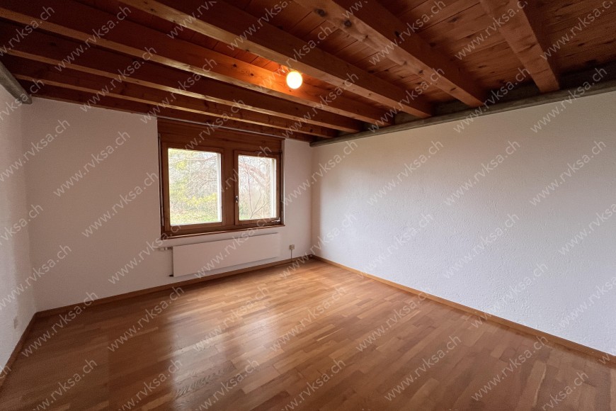 Appartement de 6 pièces, 200 m2, à Bôle - Chambre N°4 