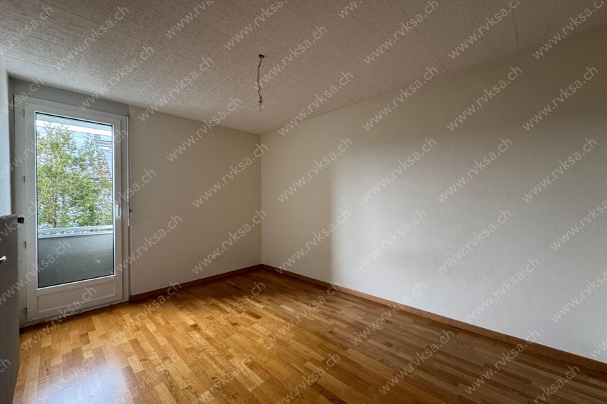 Appartement de 4 pièces, 74 m2, à Cornaux - Chambre N°2 