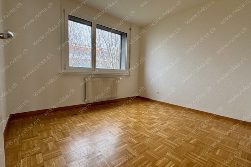 Appartement de 4 pièces, 74 m2, à Cornaux - Chambre N°1 