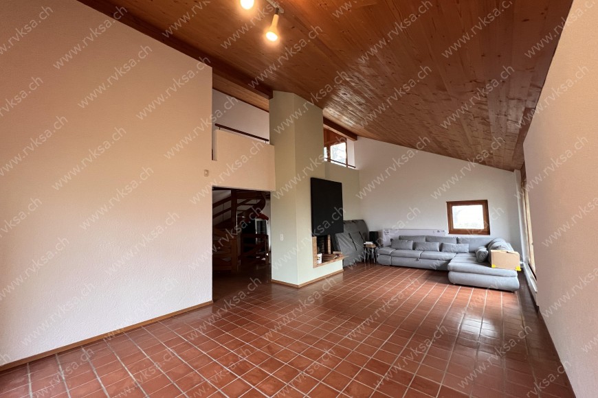 Appartement de 6 pièces, 200 m2, à Bôle - Séjour 