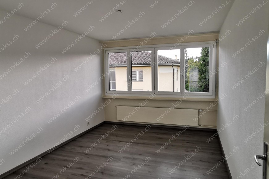 Appartement de 3 pièces, 74.20 m2, à Les Geneveys-sur-Coffrane Appartement de 3 pièces, 74.20 m2, à Les Geneveys-sur-Coffrane - Chambre N°1