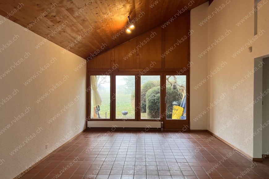 Appartement de 6 pièces, 200 m2, à Bôle - Séjour 