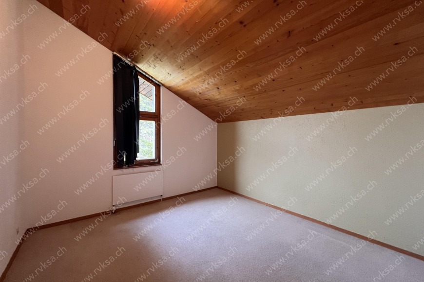 Appartement de 6 pièces, 200 m2, à Bôle - Chambre N°1 