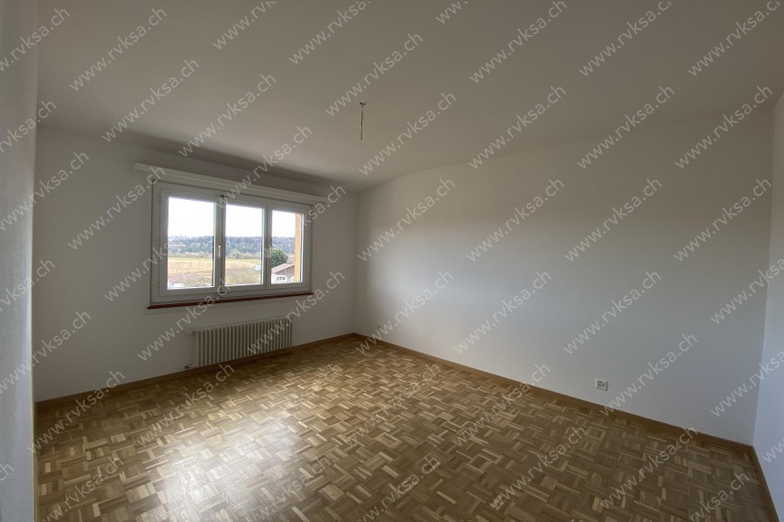 Appartement de 3 pièces, 83 m2, à Coffrane - Chambre N°2 