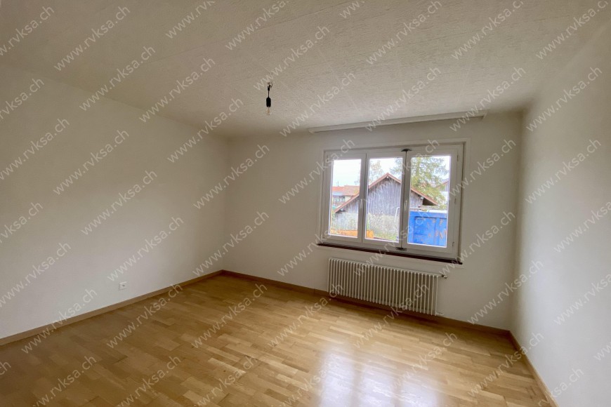 Appartement de 4 pièces, 71 m2, à Coffrane - Chambre N°1 