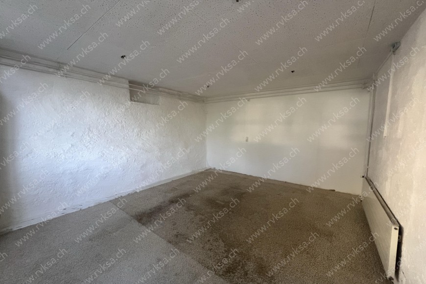 Local commercial de 1.5 pièces, 39.79 m2, à Bôle Local commercial de 1.5 pièces, 39.79 m2, à Bôle - Chambre N°1