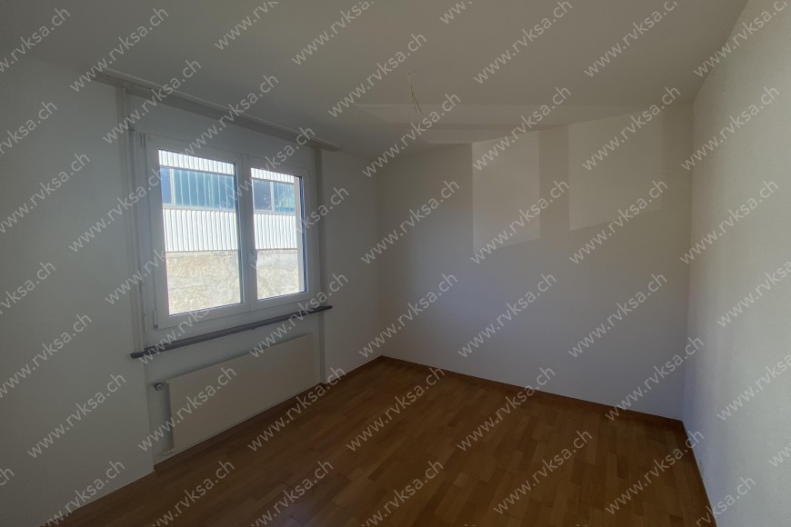 Appartement de 4 pièces, à Les Geneveys-sur-Coffrane - Chambre N°2 