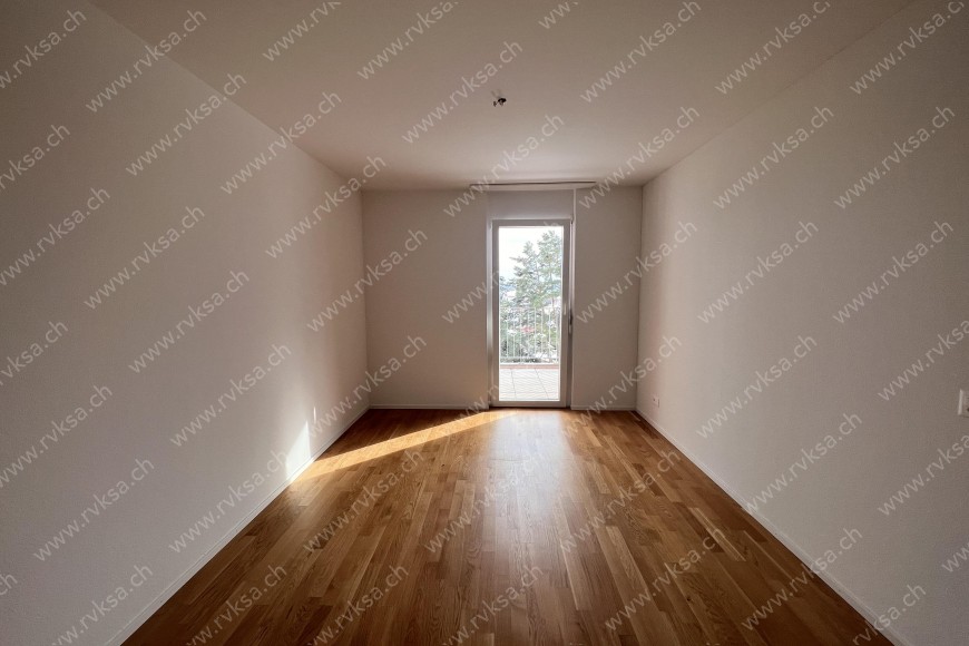 Appartement de 4 pièces, 92.9 m2, à Bôle - Chambre N°1 