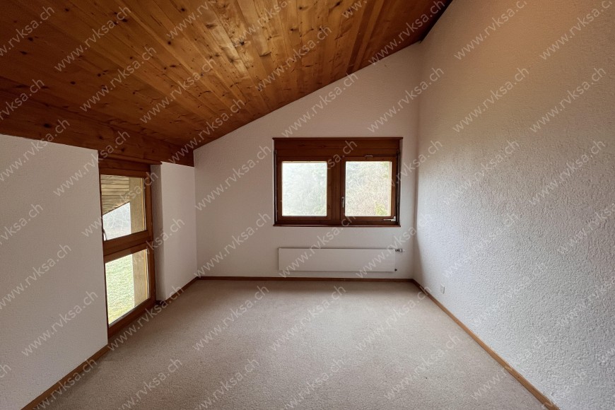 Appartement de 6 pièces, 200 m2, à Bôle - Chambre N°1 