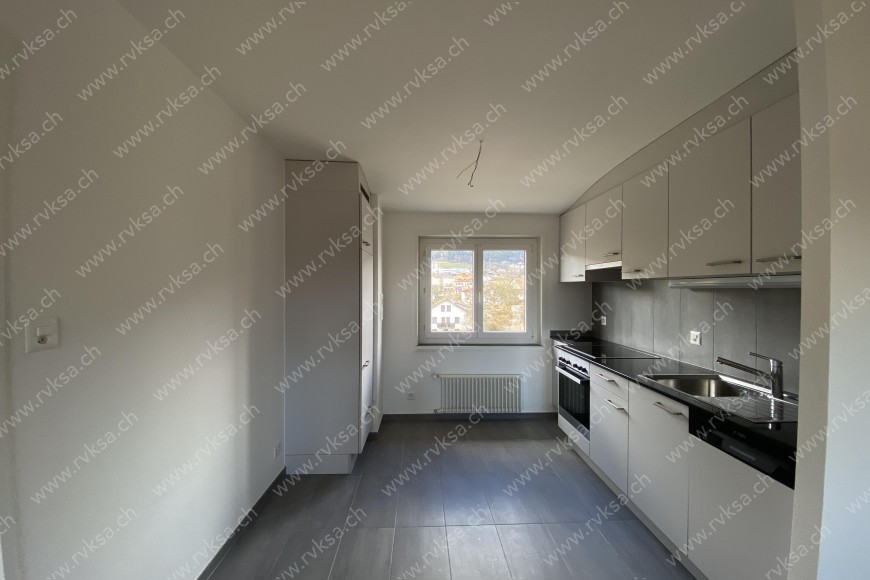 Appartement de 3 pièces, 83 m2, à Coffrane - Séjour 