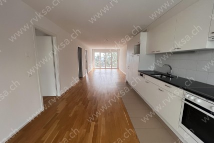 Appartement de 4 pièces, 92.9 m2, à Bôle - Séjour 