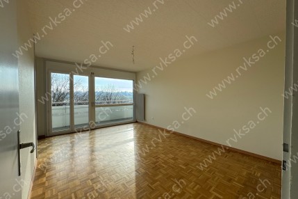 Appartement de 4 pièces, 74 m2, à Cornaux - Séjour 