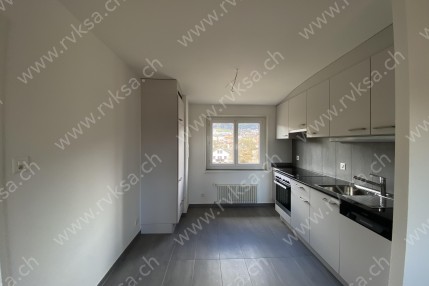 Appartement de 3 pièces, 83 m2, à Coffrane - Séjour 