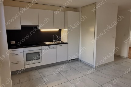 Appartement de 3 pièces, 74.20 m2, à Les Geneveys-sur-Coffrane - Séjour 